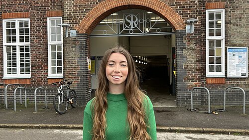 Chelsea Whyte outside New Haw Station